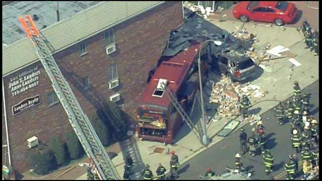 Bus crashes into NYC building, shears off part of it; 6 hurt - WSVN ...