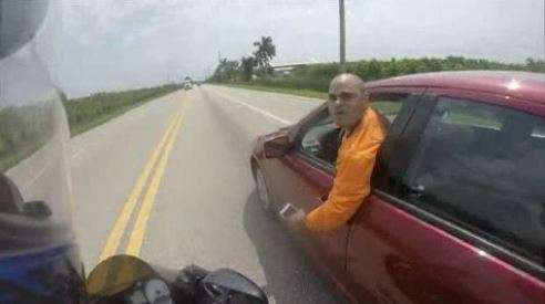 Motorcyclist nearly driven off road in road rage altercation - WSVN ...