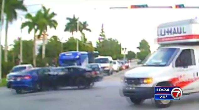 Dashboard cam captures good Samaritan rescuing trapped driver - WSVN ...