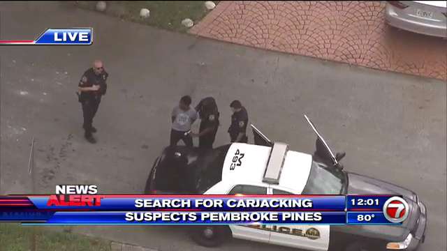 Armed carjacking suspects in custody after police perimeter set up in ...