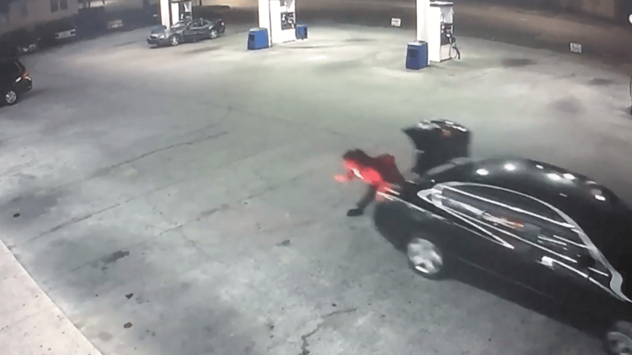 Surveillance video shows woman escaping kidnapper by jumping out of car ...