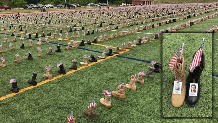 Thousands of combat boots line Fort Bragg field in remembrance of