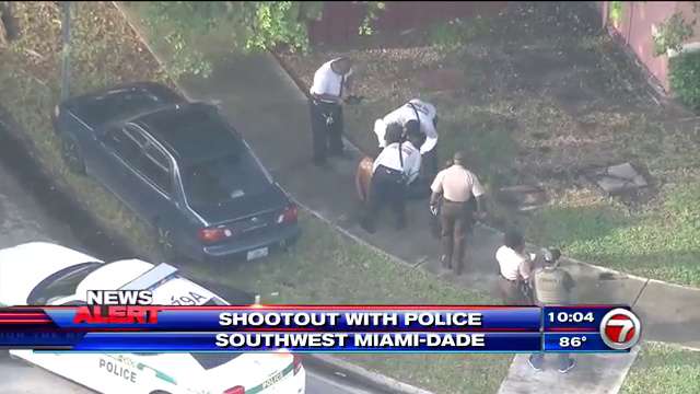 2 in custody, 1 at large after police chase ends in crash, shootout ...