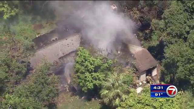 NWMD home catches fire with people inside - WSVN 7News | Miami News ...