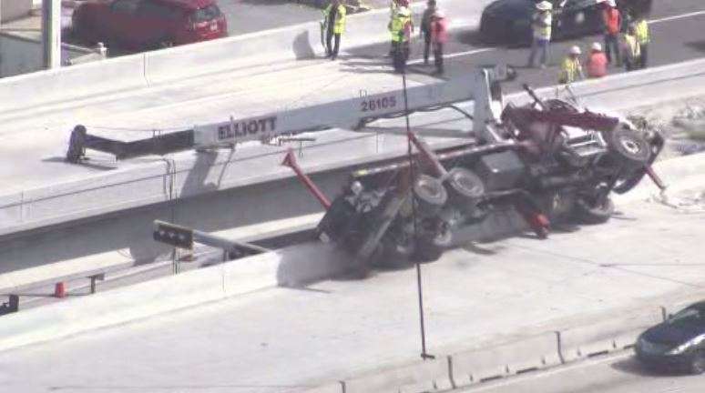 Worker in critical condition after falling from bucket truck onto ...