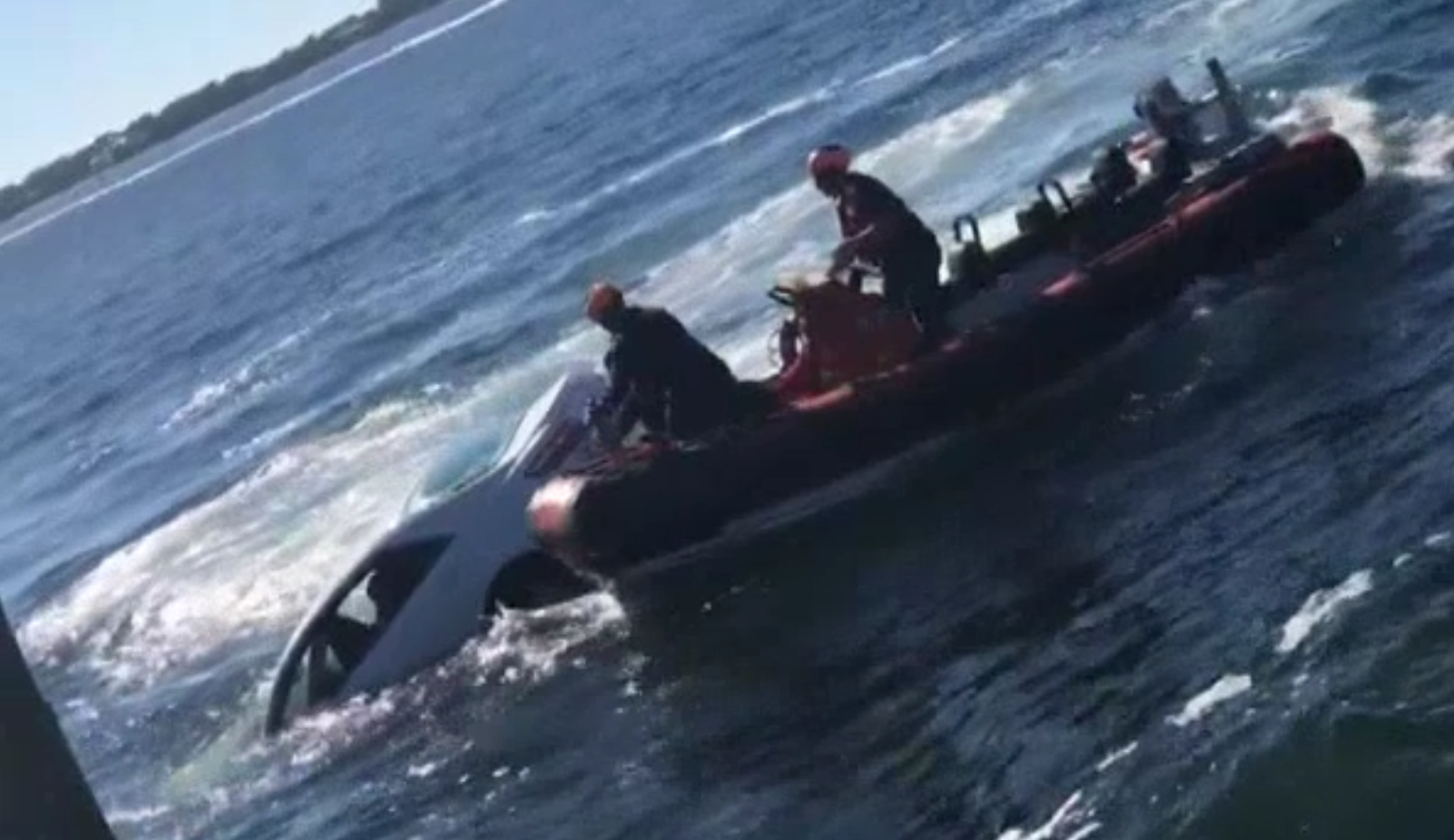 Coast Guard rescues elderly man from sinking car in Florida marina ...