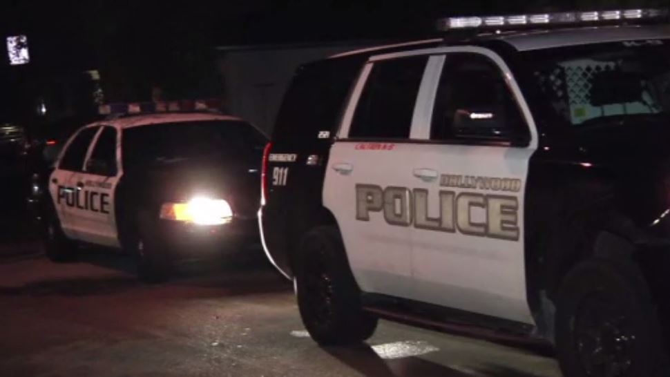 Authorities take man into custody for allegedly stabbing woman near gas