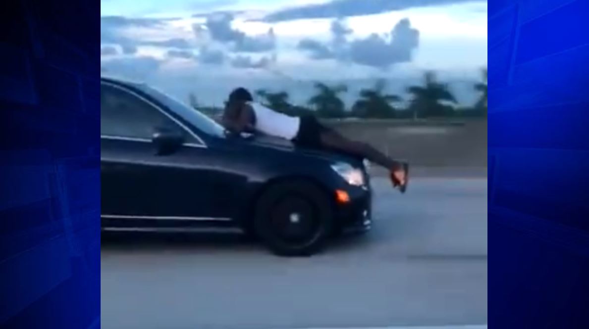 Video shows man riding on hood of car on I95 in Miami WSVN 7News