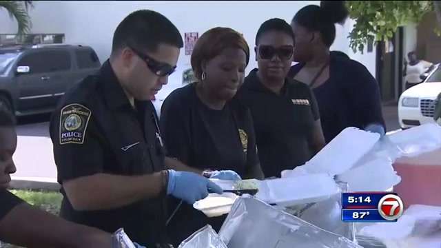 Volunteers serve food to residents displaced in Miami Gardens apartment ...