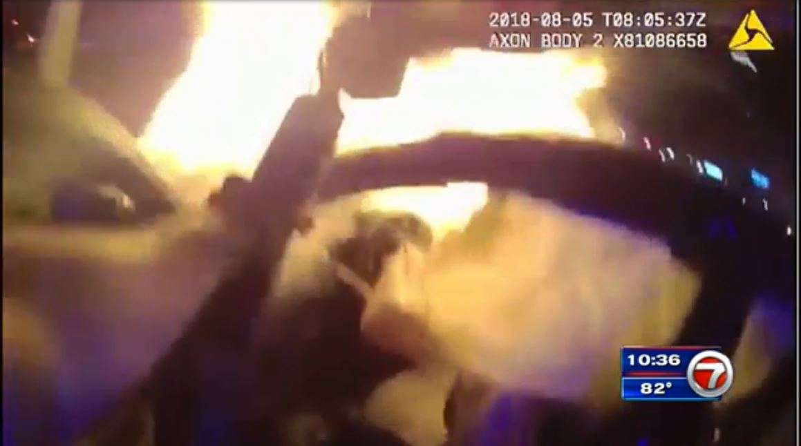 Atlanta police rescue trapped passenger from burning car - WSVN 7News ...