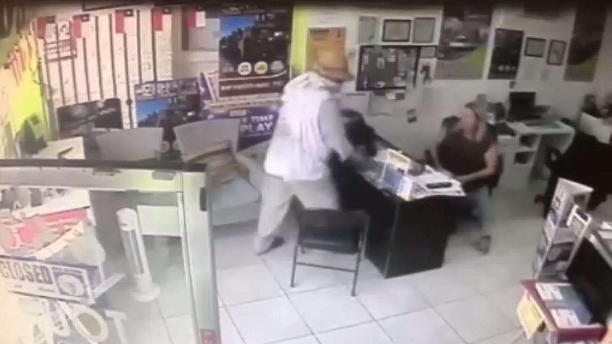 Gunman caught on camera during robbery at business in Miami Beach ...