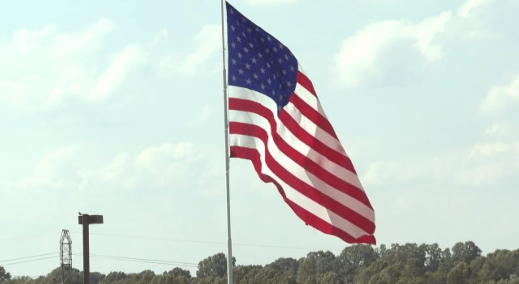 Alabama car dealership offering Bible, shotgun, American flag with