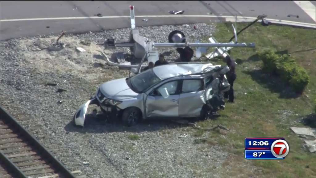 Train Crashes Into Car