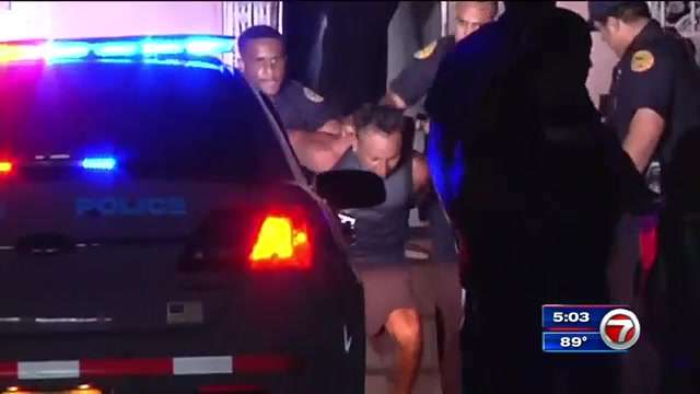 Police arrest man barricaded inside Miami home, rescue family inside ...