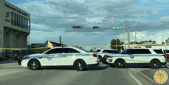 Police: Man taken into custody after threatening woman with gun in ...