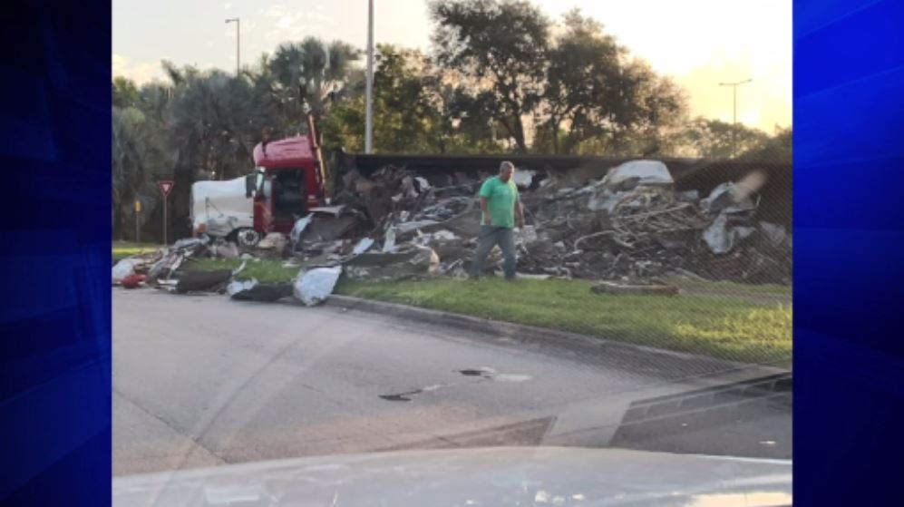 Driver hurt after recycling truck overturns in OpaLocka WSVN 7News