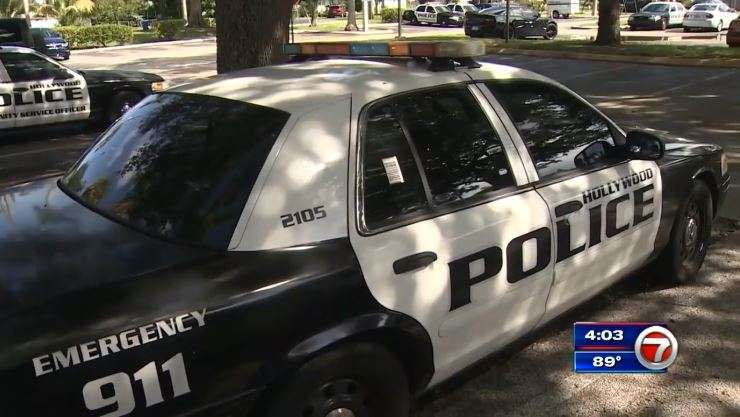 Hollywood police officer charged with battery on handcuffed suspect ...