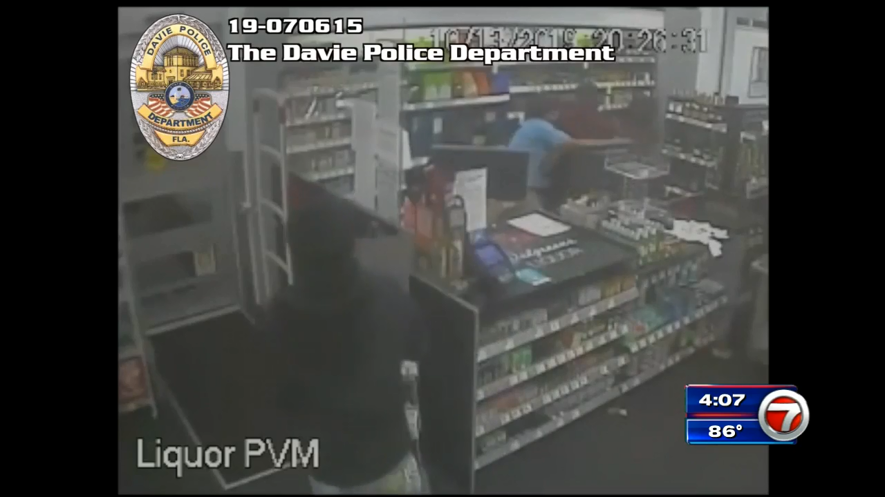 Surveillance video captures Davie liquor store robbery; 1 arrested