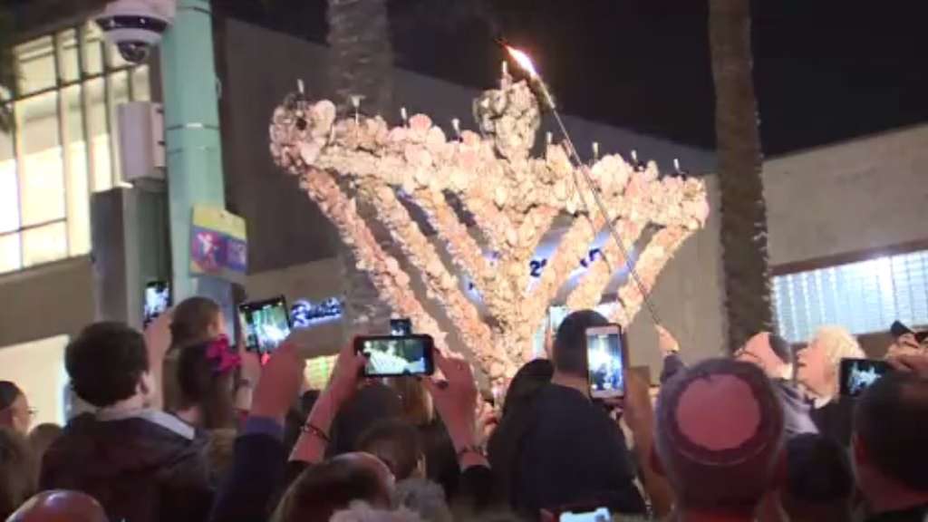 Miami Beach celebrates 1st night of Hanukkah with seashell menorah