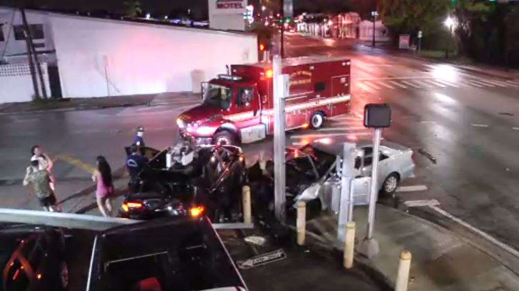 At least 1 hospitalized after crash in Miami causes pole to fall on ...