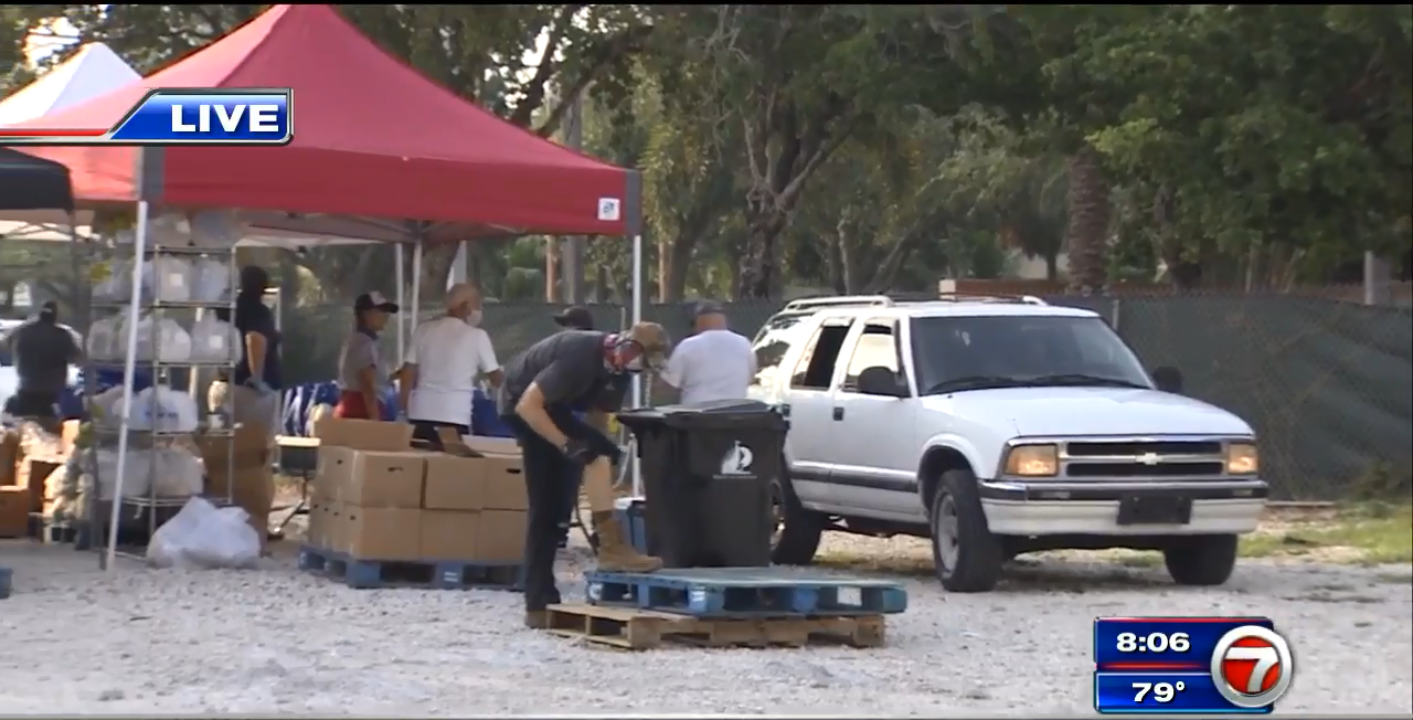 Volunteers at Pantry of Broward prepare to help families at another