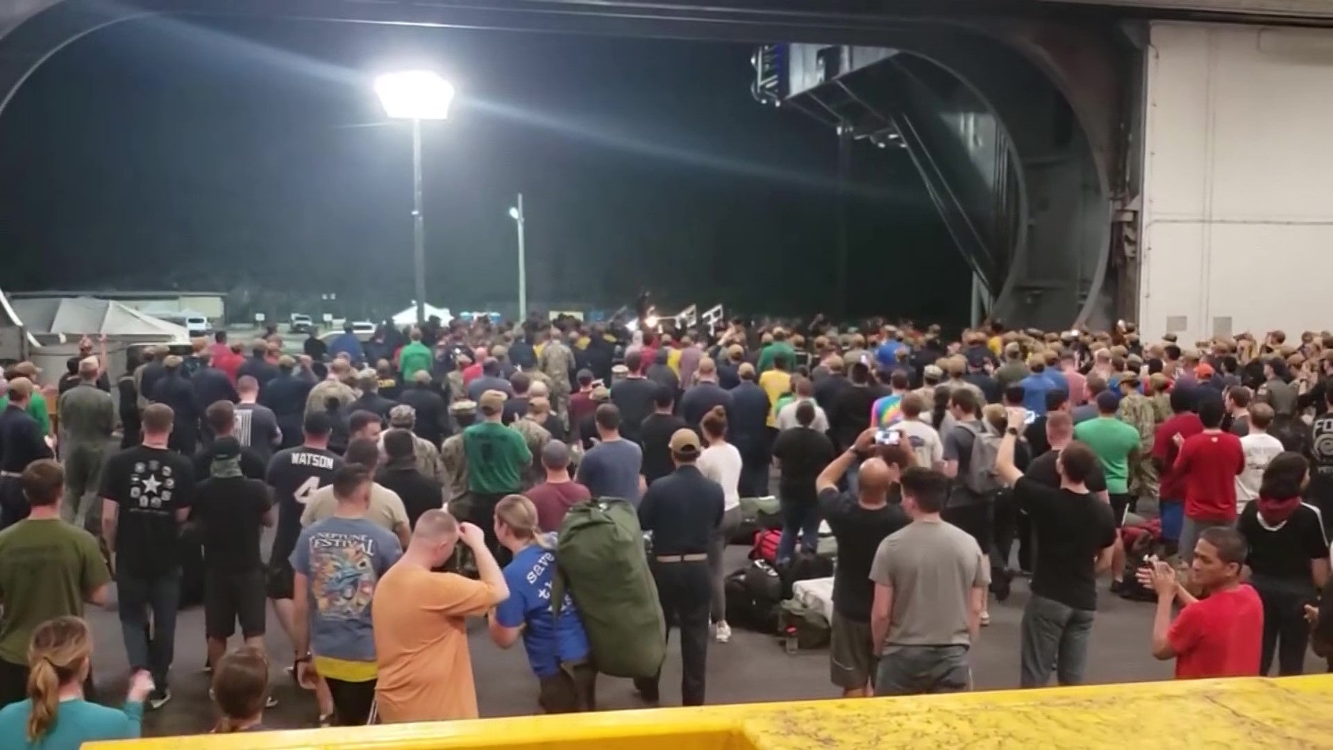 Sailors cheer for aircraft carrier commander who was removed after