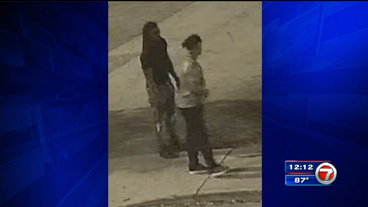1 in custody, 1 at large as police release surveillance footage of