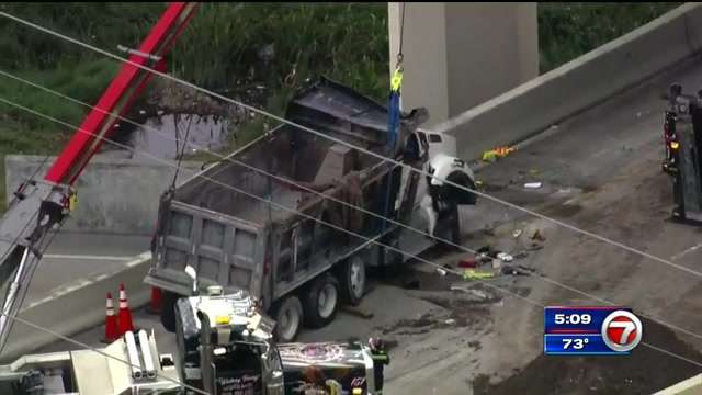 Dump truck overturns on I-595 ramp in Davie, causing traffic delays ...