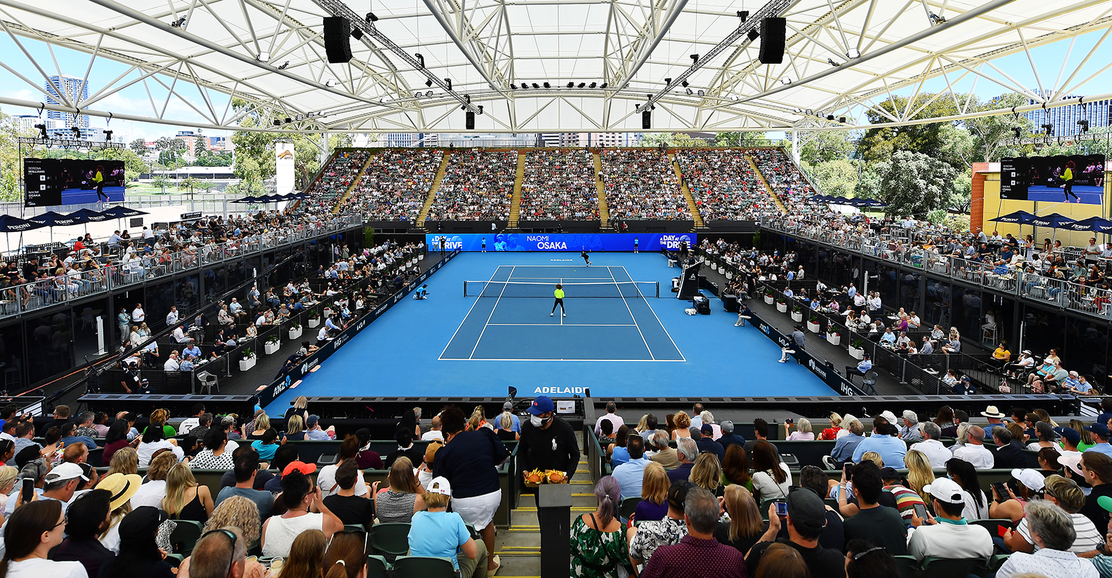 Maskless crowds pack Australian Open tennis exhibition in Covidfree