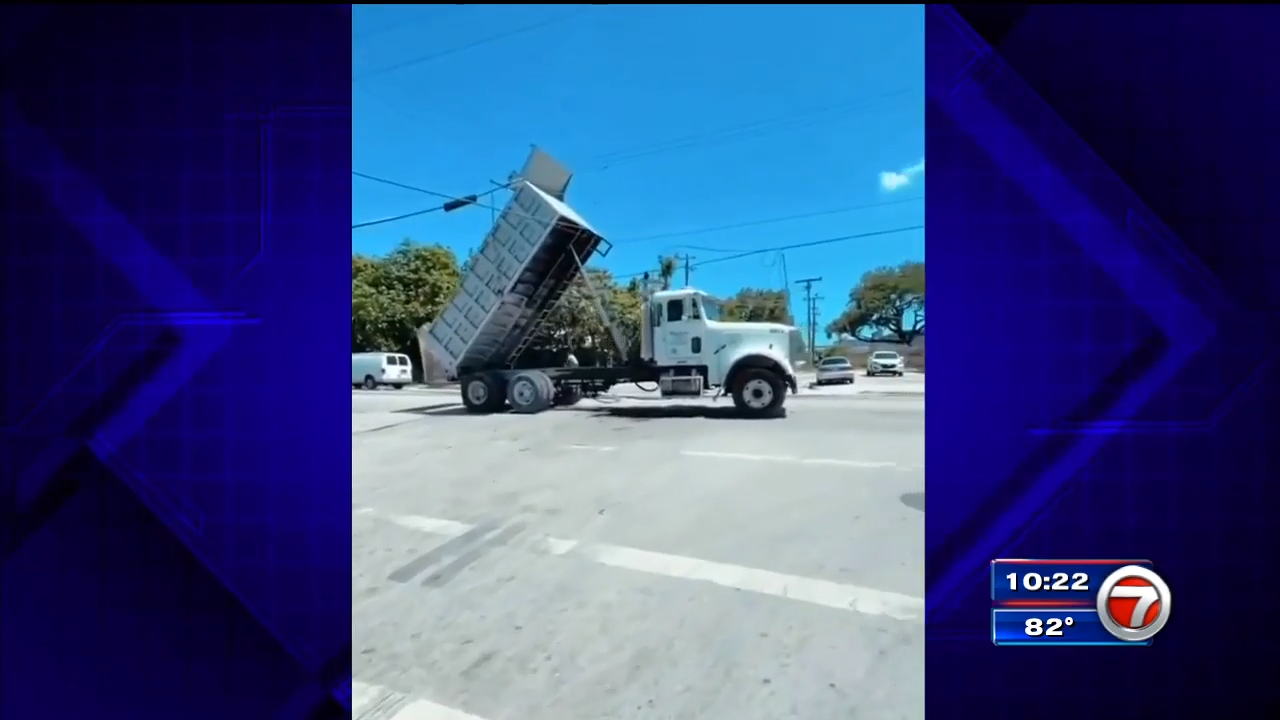 Dump truck gets tangled in powerlines in NW Miami-Dade - WSVN 7News ...