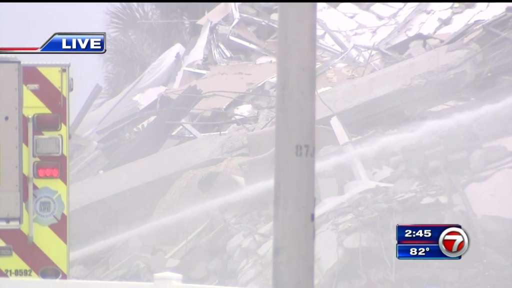 Crews battle apparent fire at scene of Surfside condo ...