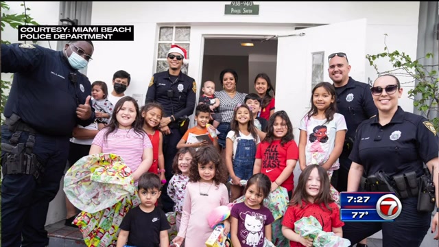 Miami Beach Police officers deliver toys to over 300 children – WSVN 7News | Miami News, Weather, Sports