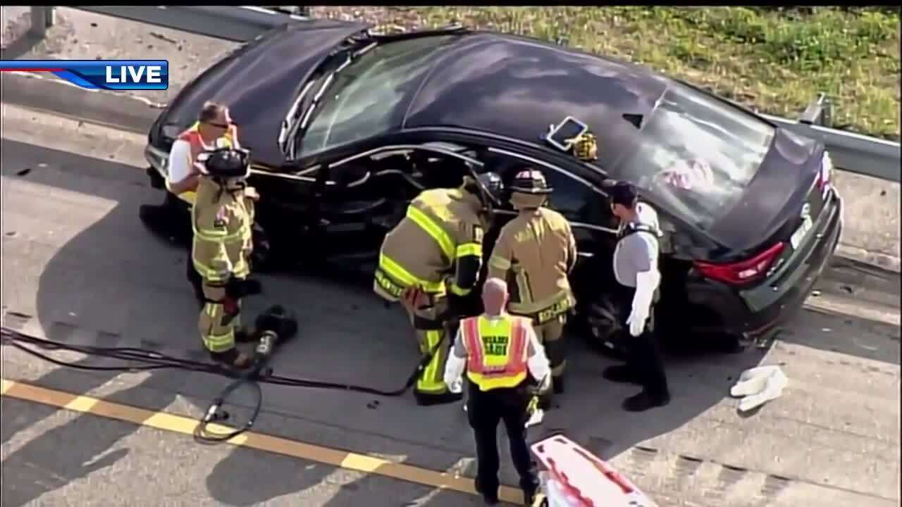 Fire rescue crews work to rescue man pinned in car along I-75 in Miami ...