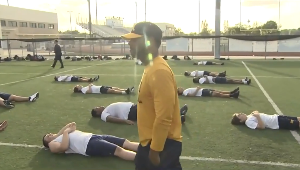 Secret to success: St. Thomas Aquinas High School football players practice meditation
