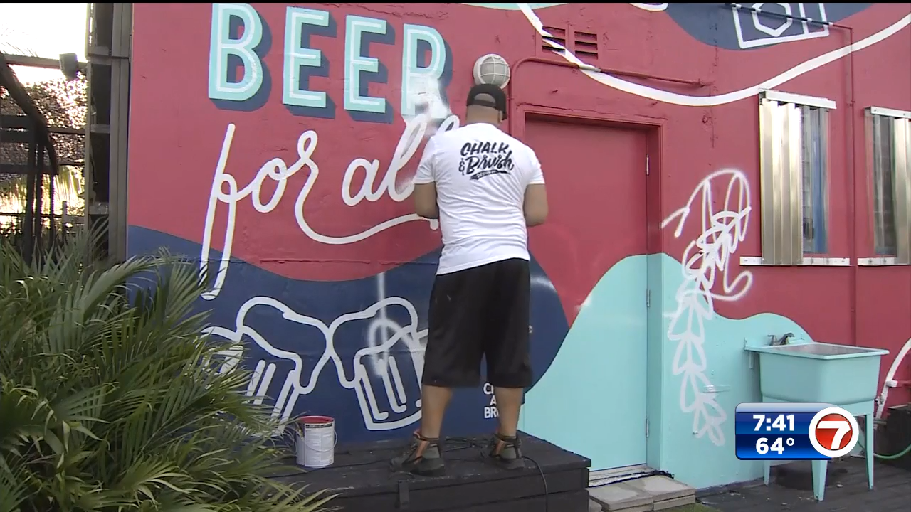 Local artist helps restore vandalized mural at Fort Lauderdale