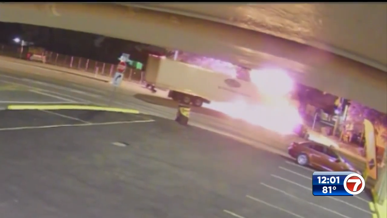 1 transported after semi truck, car catch fire following crash in Miami
