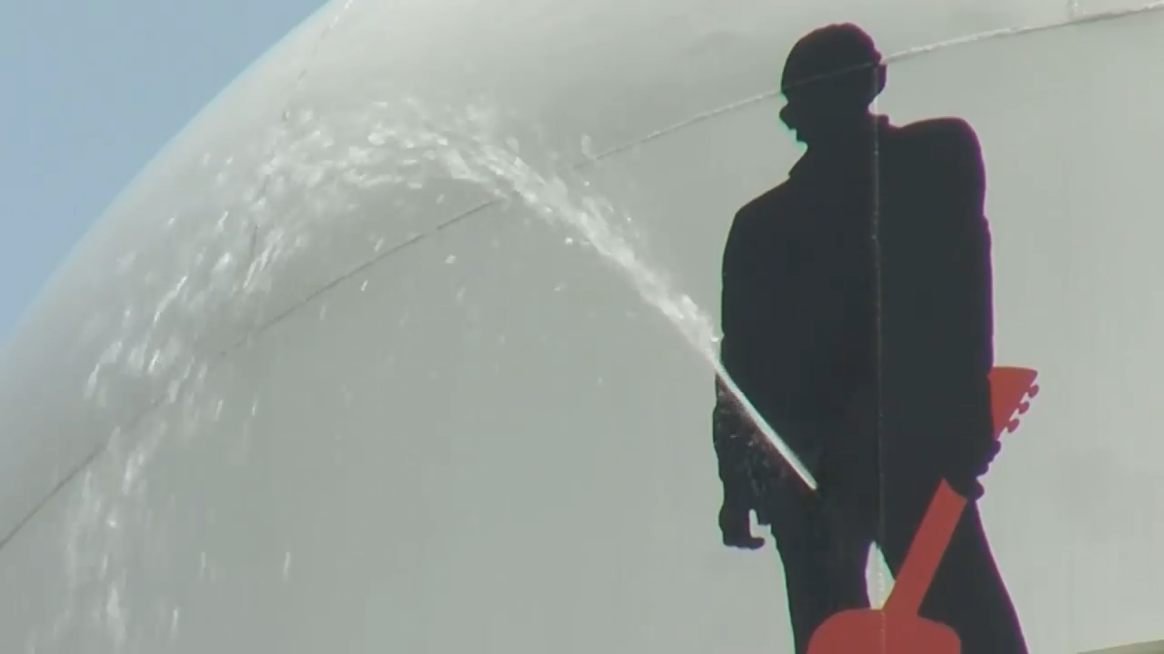 Johnny Cash silhouette on Arkansas water tower vandalized WSVN 7News Miami News, Weather