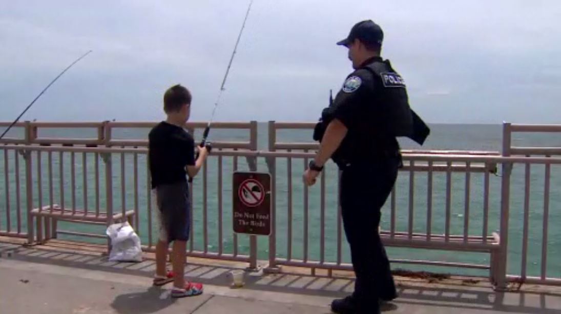 Sunny Isles Beach Police officers teach children, teens to fish in
