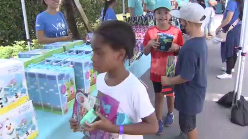 Little Lighthouse Foundation, Dolphins team up for Christmas in July celebration