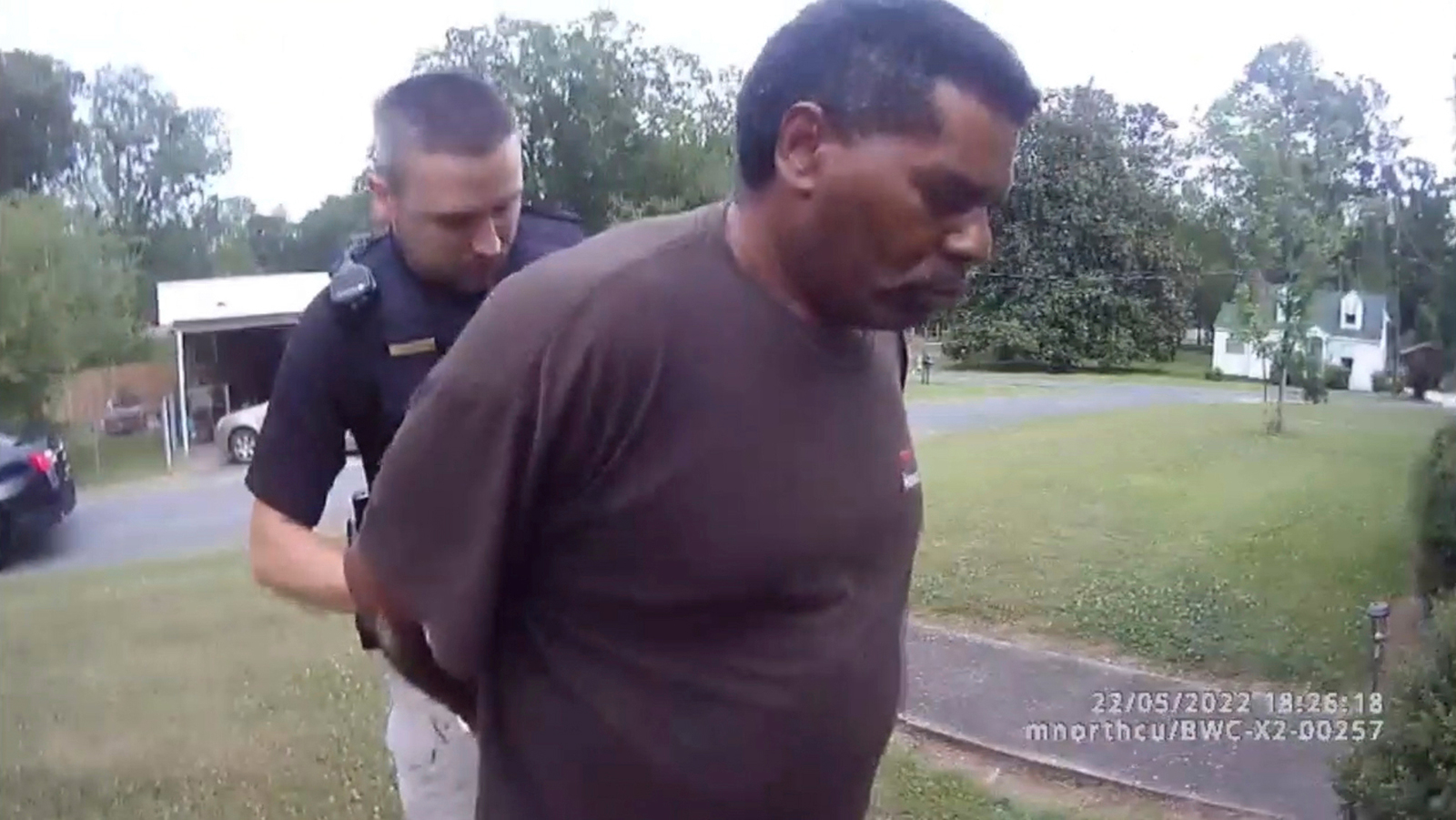Black pastor arrested while watering neighbor’s flowers files federal(02)