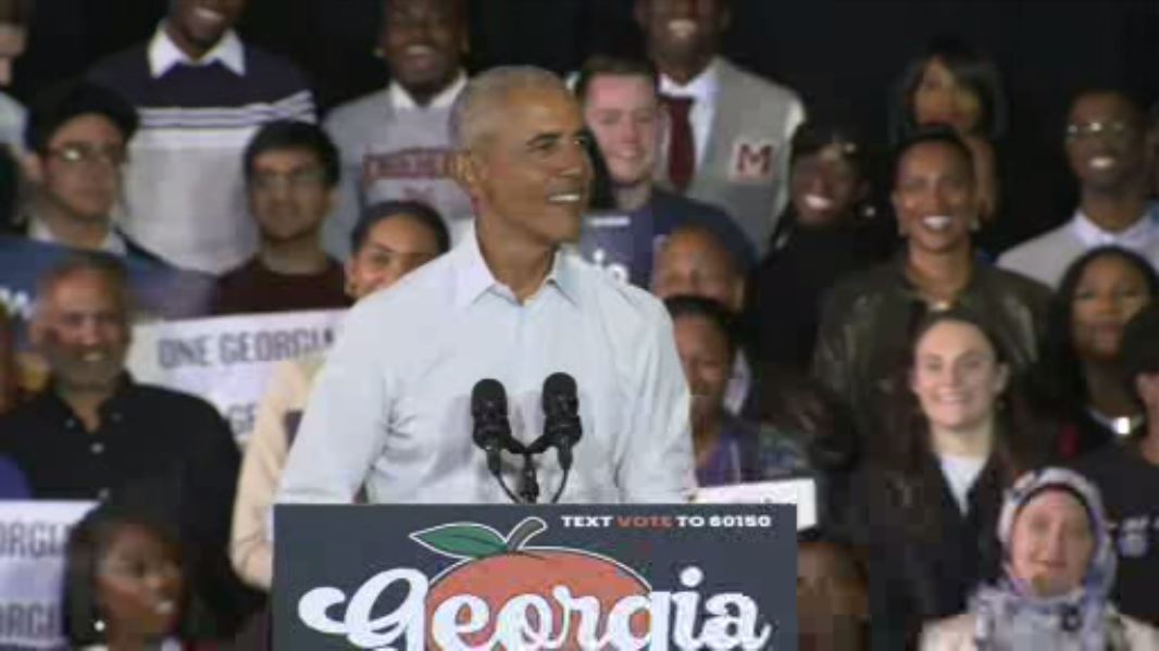 Obama, campaigning in Georgia, warns of threats to democracy