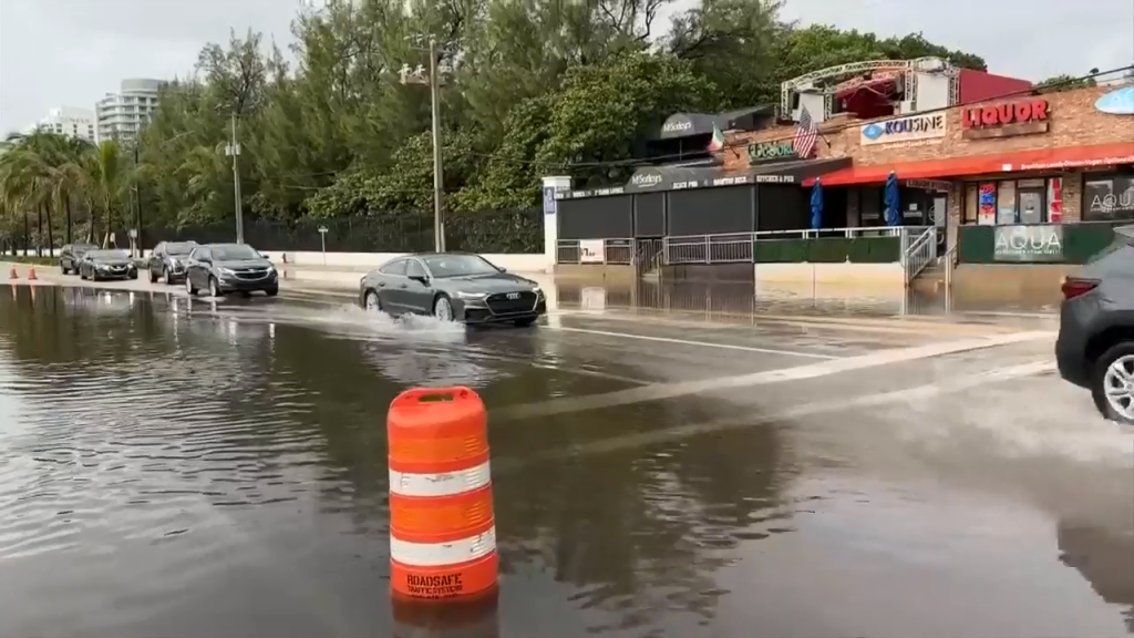 South Florida residents, tourists endure high tides, flooding as