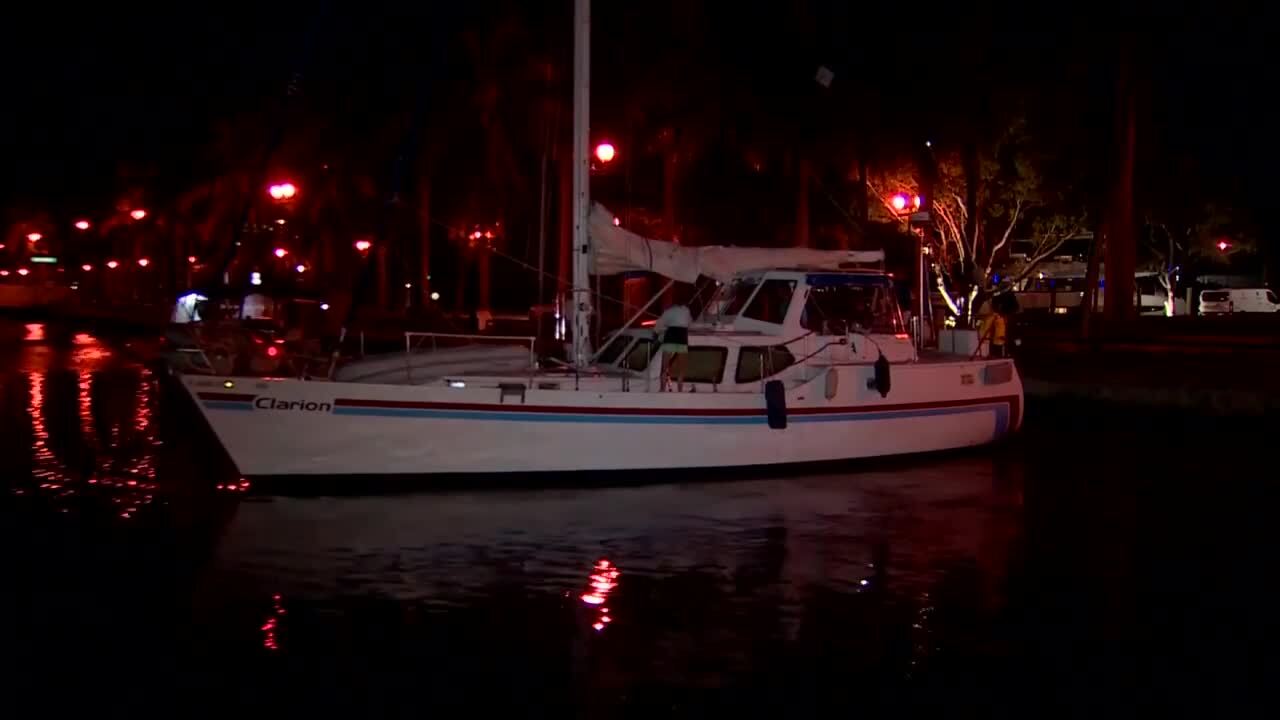 Crews tow away stuck sailboat on bridge in Fort Lauderdale