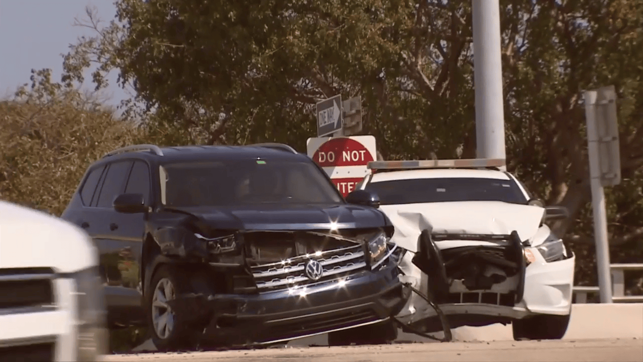 Vehicle slams into police cruiser, hits other car during traffic stop ...