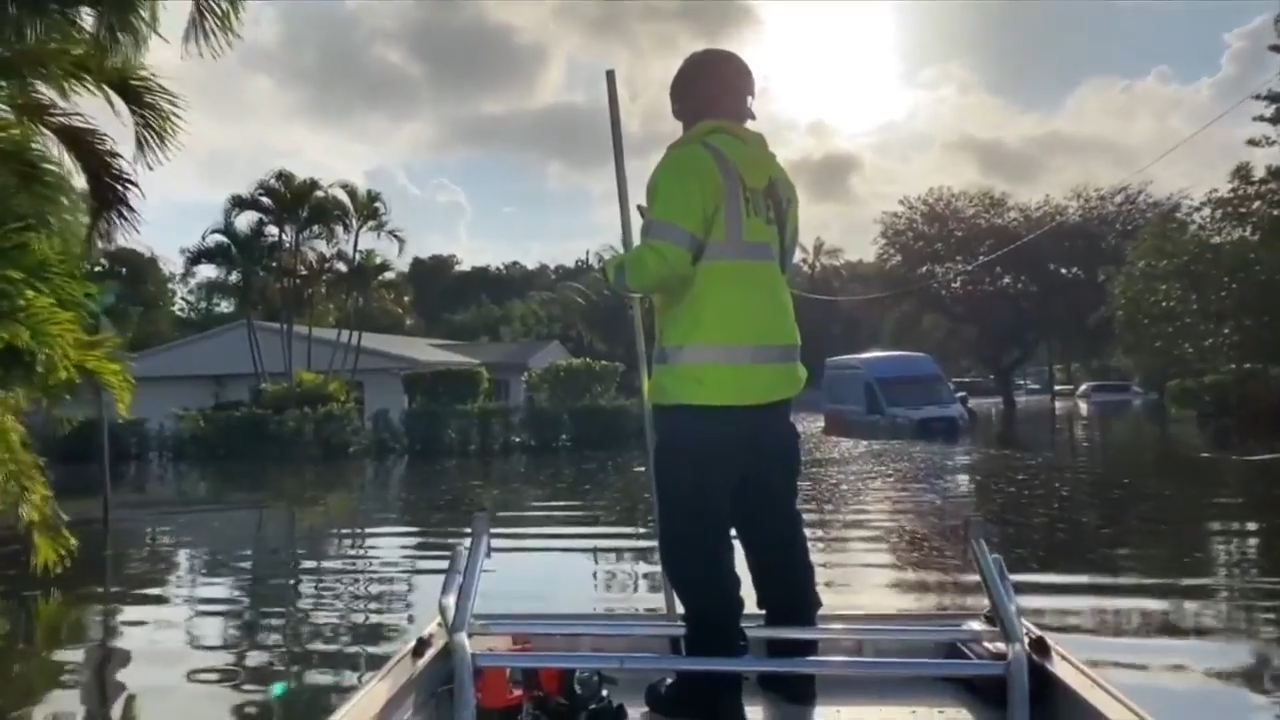 Rescue crews work to save residents affected by severe floods in Fort ...