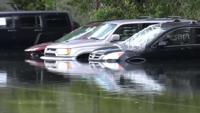 Drivers abandon stalled cars after severe floods impact Broward County ...