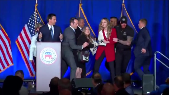 Protesters rush stage interrupt DeSantis GOP fundraiser speech in New Hampshire amid backlash over trip Protesters rush stage interrupt DeSantis GOP fundraiser speech in New Hampshire amid backlash over trip