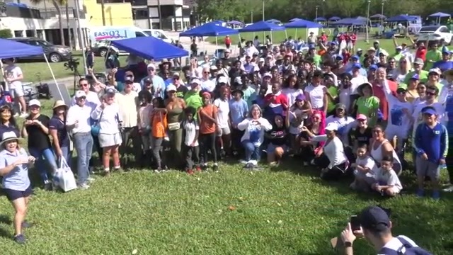 Volunteers clean up trash along Biscayne Bay as part of 41st Baynanza at Pelican Harbor Marina