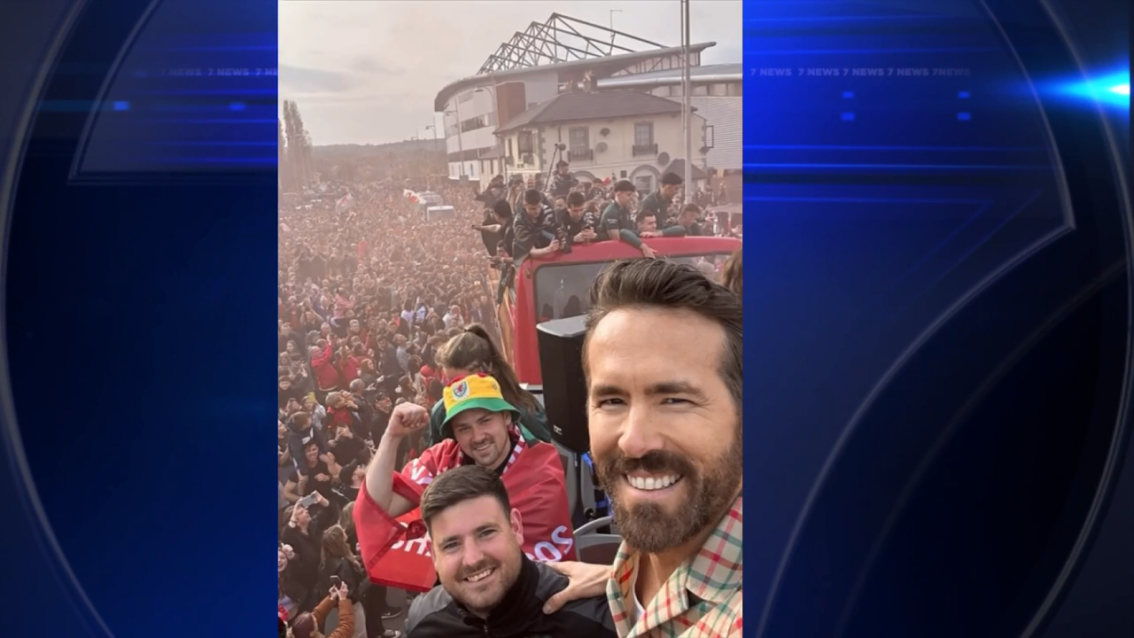 Ryan Reynolds and Rob McElhenney join Wrexham’s opentop bus parade