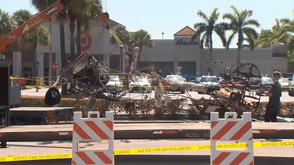 Crews remove banner plane as investigation into fatal crash continues